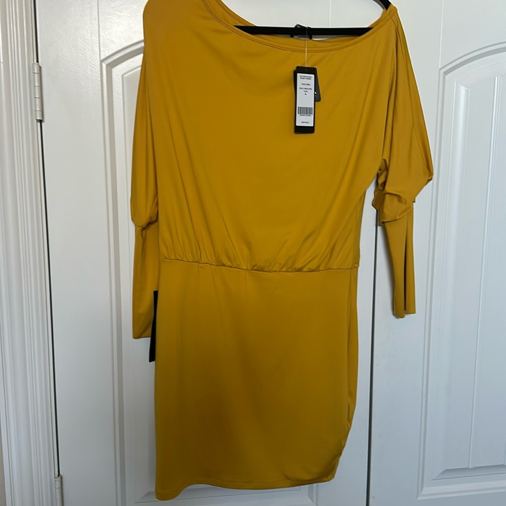 Bebe Spicy mustard off shoulder slinky dress